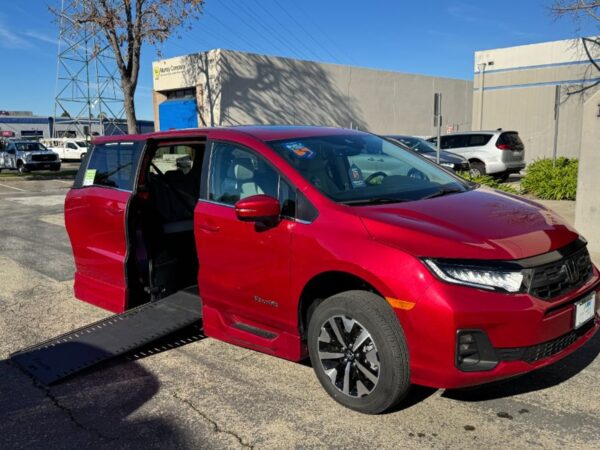 Red Honda Odyssey with BraunAbility Side Entry Automatic In Floor conversion