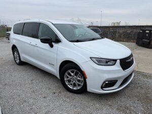 White Chrysler Pacifica with Driverge Rear Entry Manual Fold Out conversion