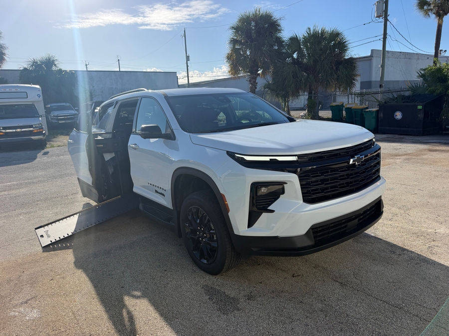 White Chevrolet Traverse with BraunAbility Side Entry Automatic In Floor conversion