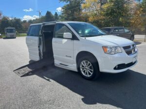White Dodge Grand Caravan with BraunAbility Side Entry Automatic Fold Out conversion