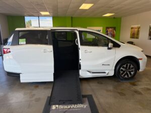 White Honda Odyssey with BraunAbility Side Entry Automatic In Floor conversion