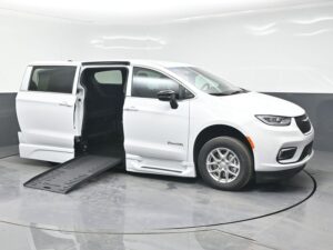 White Chrysler Pacifica with BraunAbility Side Entry Automatic Fold Out conversion