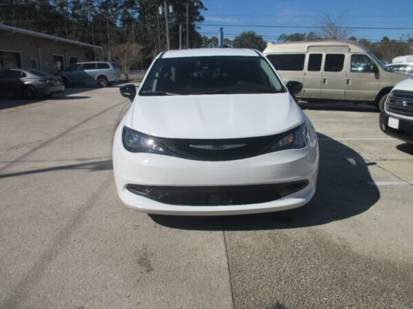 White Chrysler Voyager with Driverge Side Entry Automatic Fold Out conversion