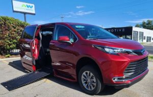 Red Toyota Sienna with BraunAbility Side Entry Automatic In Floor conversion