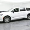 White Chrysler Voyager with BraunAbility Rear Entry Manual Fold Out conversion