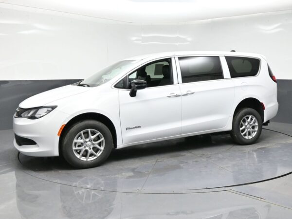 White Chrysler Voyager with BraunAbility Rear Entry Manual Fold Out conversion