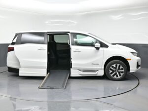 White Honda Odyssey with BraunAbility Side Entry Automatic In Floor conversion