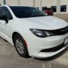 White Chrysler Voyager with Driverge Side Entry Automatic Fold Out conversion