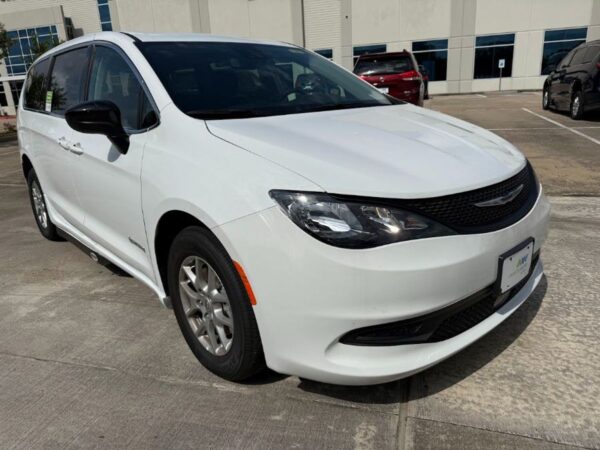 White Chrysler Voyager with Driverge Side Entry Automatic Fold Out conversion