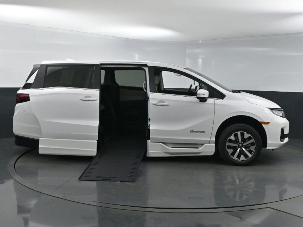 White Honda Odyssey with BraunAbility Side Entry Automatic In Floor conversion