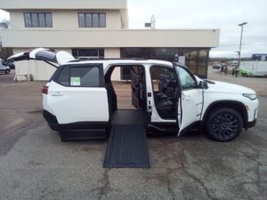 White Chevrolet Traverse with BraunAbility Side Entry Automatic In Floor conversion