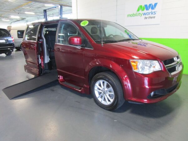 Red Dodge Grand Caravan with Vantage Mobility Side Entry Automatic In Floor conversion