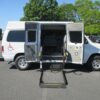 White Ford Econoline with Other Side Entry Automatic Fold Out conversion