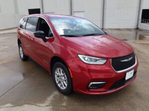 Red Chrysler Pacifica with BraunAbility Rear Entry Manual Fold Out conversion