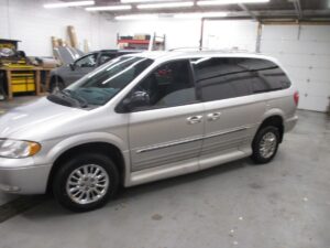Silver Chrysler Town and Country with Vantage Mobility Side Entry Automatic In Floor conversion