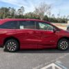 Red Honda Odyssey with BraunAbility Side Entry Automatic In Floor conversion