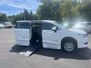 White Chrysler Voyager with BraunAbility Side Entry Automatic Fold Out conversion