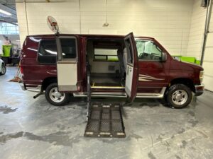Red Ford E-Series with Other Side Entry Automatic Fold Out conversion