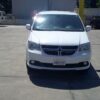 White Dodge Grand Caravan with Vantage Mobility Side Entry Manual In Floor conversion