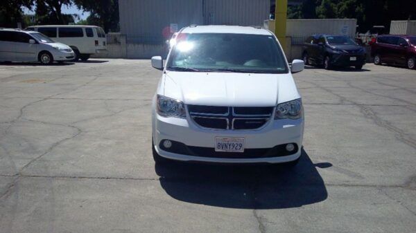 White Dodge Grand Caravan with Vantage Mobility Side Entry Manual In Floor conversion