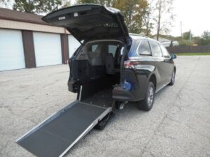 Blue Toyota Sienna with Driverge Rear Entry Manual Fold Out conversion
