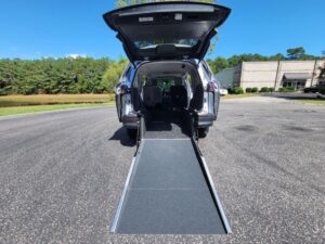 Silver Toyota Sienna with Driverge Rear Entry Manual Fold Out conversion