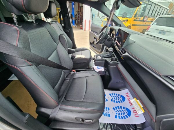 Silver Toyota Sienna with BraunAbility Side Entry Automatic Fold Out conversion