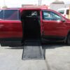 Red Chevrolet Traverse with BraunAbility Side Entry Automatic In Floor conversion