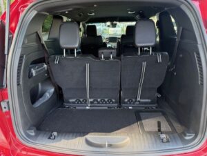 Red Chrysler Pacifica with BraunAbility Side Entry Automatic In Floor conversion