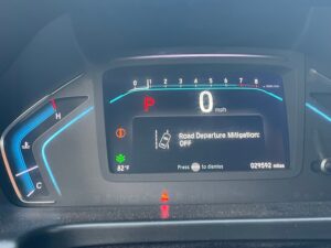 Red Honda Odyssey with BraunAbility Side Entry Automatic In Floor conversion