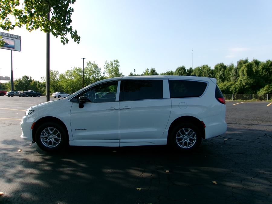 White Chrysler Pacifica with BraunAbility Side Entry Automatic Fold Out conversion
