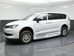 White Chrysler Voyager with BraunAbility Side Entry Automatic Fold Out conversion