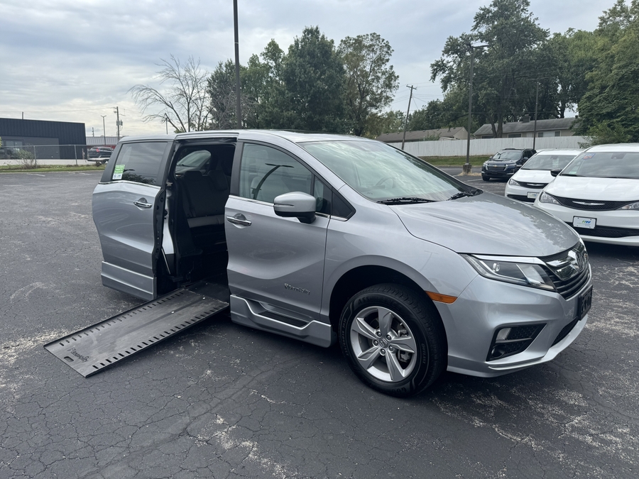 Silver Honda Odyssey with BraunAbility Side Entry Automatic In Floor conversion