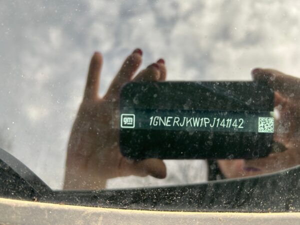 White Chevrolet Traverse with BraunAbility Side Entry Automatic In Floor conversion