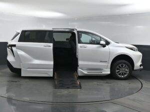 White Toyota Sienna with BraunAbility Side Entry Automatic Fold Out conversion