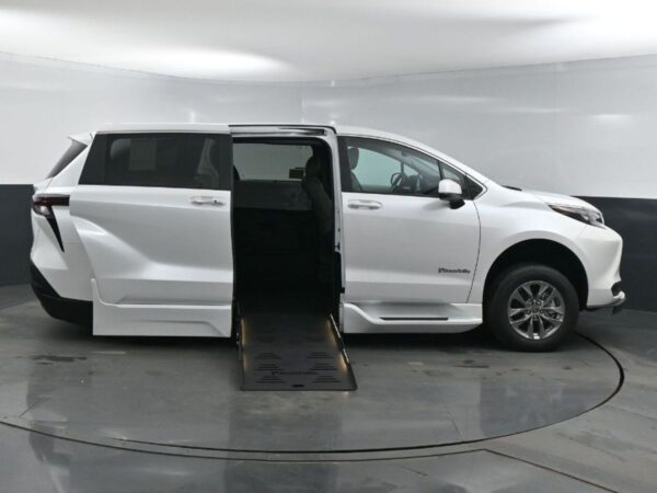 White Toyota Sienna with BraunAbility Side Entry Automatic Fold Out conversion