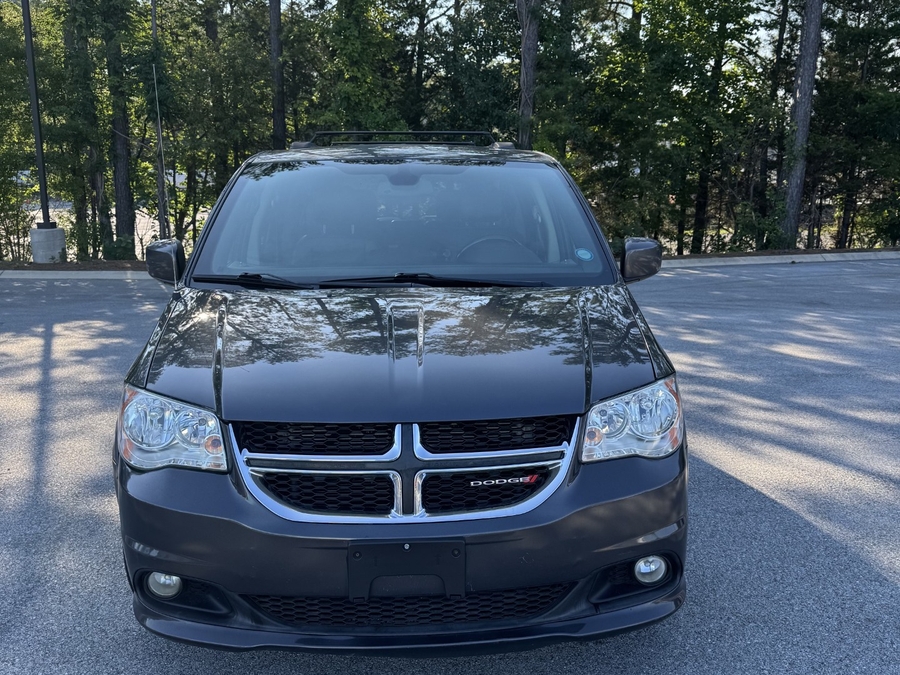 Grey Dodge Grand Caravan with Adaptive Vans Side Entry Automatic Fold Out conversion