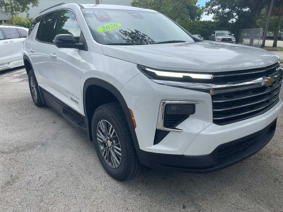 White Chevrolet Traverse with BraunAbility Side Entry Automatic In Floor conversion