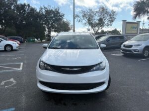 White Chrysler Voyager with Vantage Mobility Side Entry Automatic Fold Out conversion