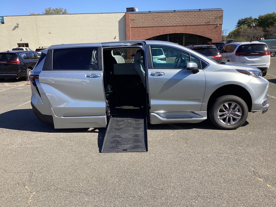 Silver Toyota Sienna with BraunAbility Side Entry Automatic Fold Out conversion