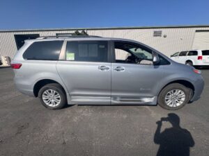 Silver Toyota Sienna with BraunAbility Side Entry Automatic Fold Out conversion