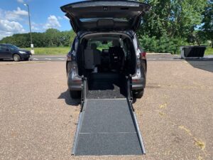 Grey Toyota Sienna with Driverge Rear Entry Manual Fold Out conversion