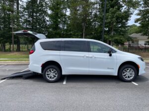 White Chrysler Voyager with BraunAbility Rear Entry Manual Fold Out conversion