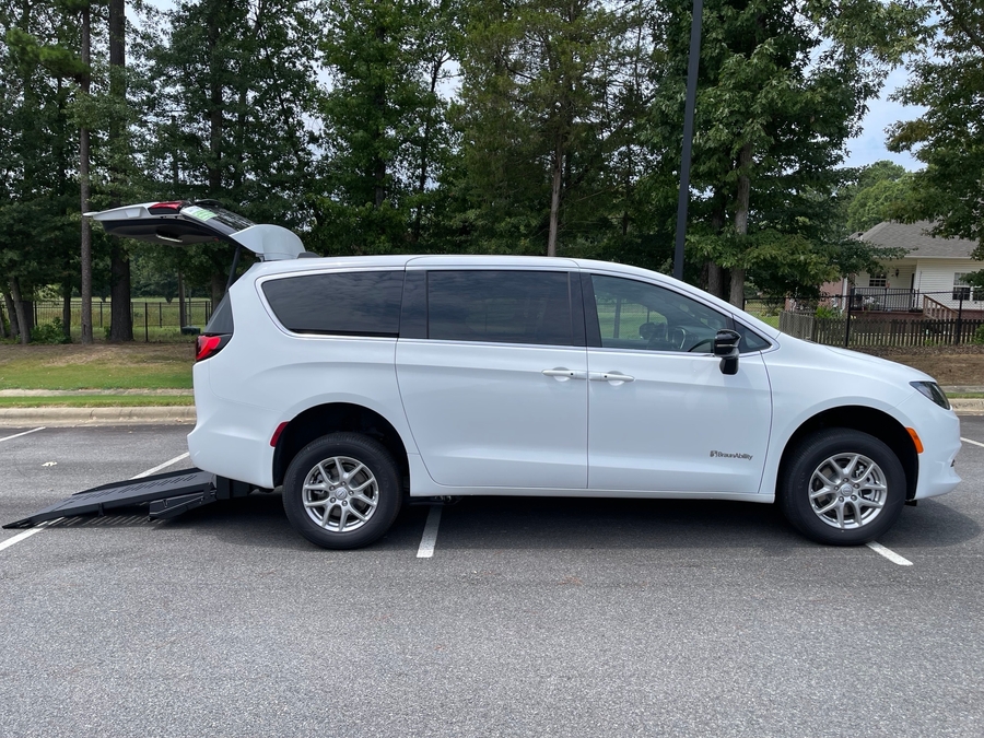 White Chrysler Voyager with BraunAbility Rear Entry Manual Fold Out conversion