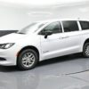 White Chrysler Voyager with BraunAbility Rear Entry Manual Fold Out conversion