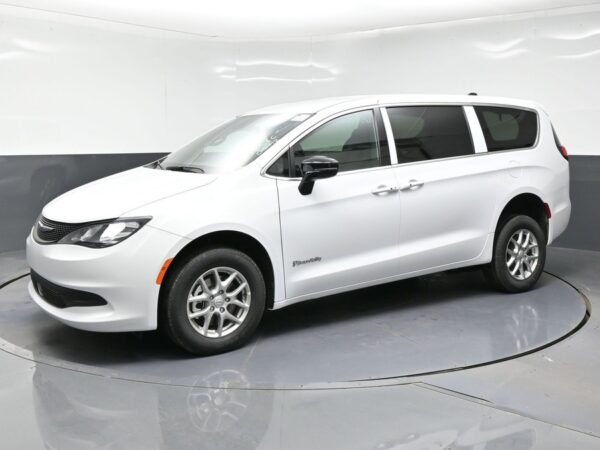 White Chrysler Voyager with BraunAbility Rear Entry Manual Fold Out conversion