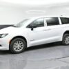 White Chrysler Voyager with BraunAbility Rear Entry Manual Fold Out conversion