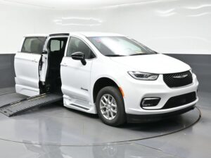 White Chrysler Pacifica with BraunAbility Side Entry Automatic Fold Out conversion