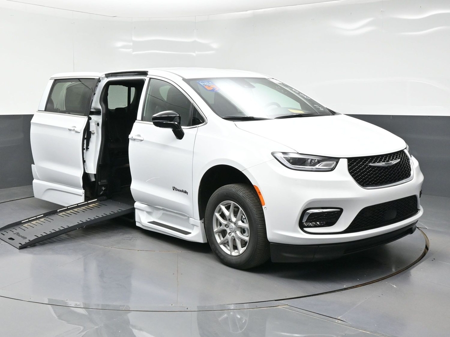 White Chrysler Pacifica with BraunAbility Side Entry Automatic Fold Out conversion
