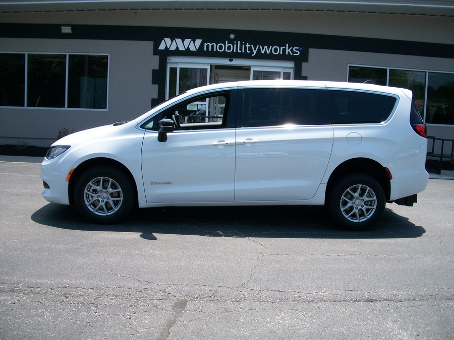 White Chrysler Voyager with BraunAbility Rear Entry Manual Fold Out conversion